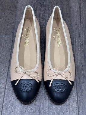 CHANEL Beige and Black Cap-Toe Ballet Flats